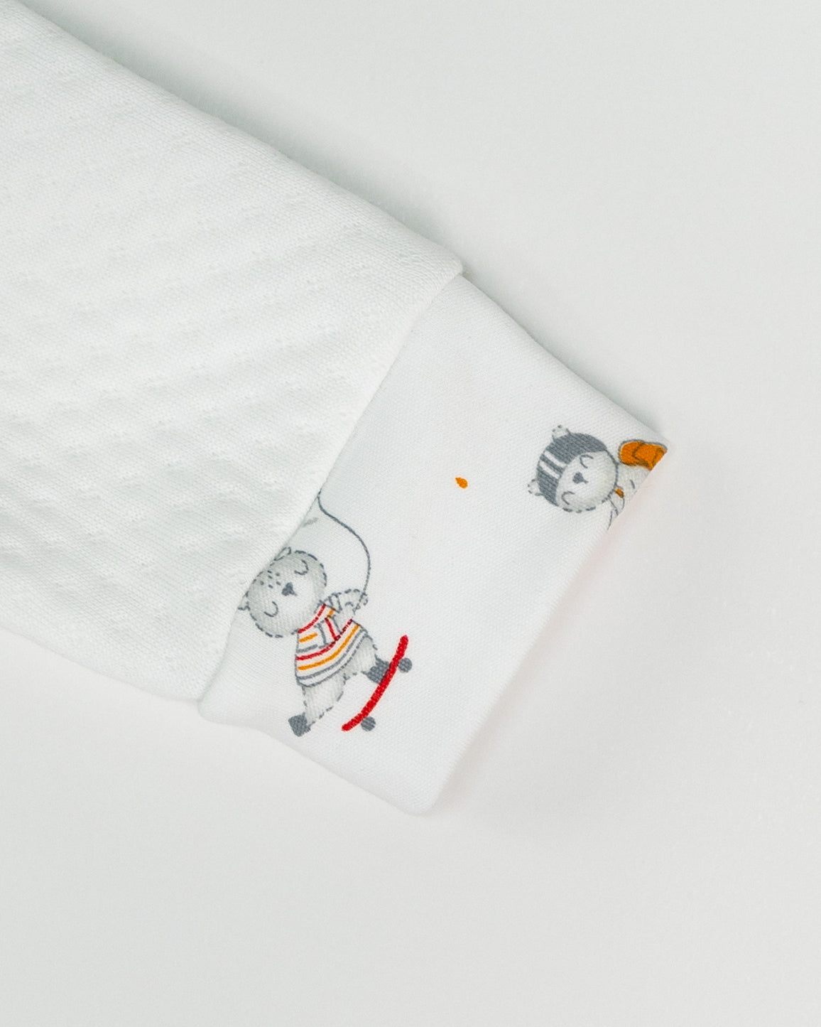 White Jacquard Baby Footie with Embroidered Bear Rider Collar